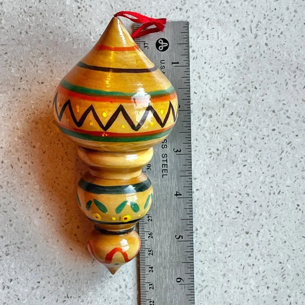 Handcrafted Wooden Hanging Ornament With Vibrant Tribal Patterns